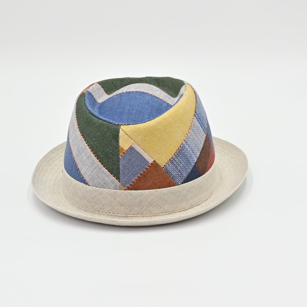 Colorful geometric-patterned hat on a light gray background