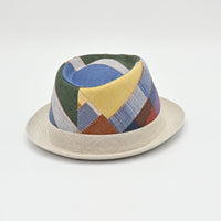 Colorful patchwork hat on a light gray background