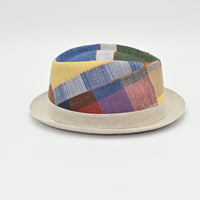Multicolored patchwork hat on a white background