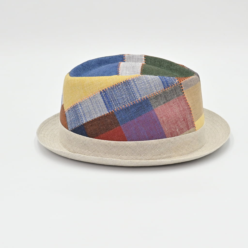 Multicolored patchwork hat on a white background