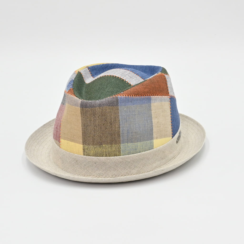 Multicolored patchwork hat on a light gray background