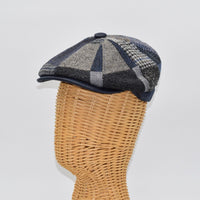 blue newsboy hat on mannequin