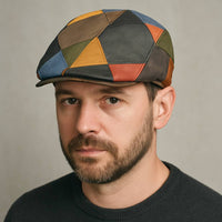 Person in multicolor leather patchwork cap