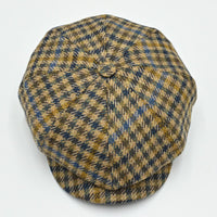 Top view of Fantasia Peaky Hat displaying the multicolor wool pattern and center button