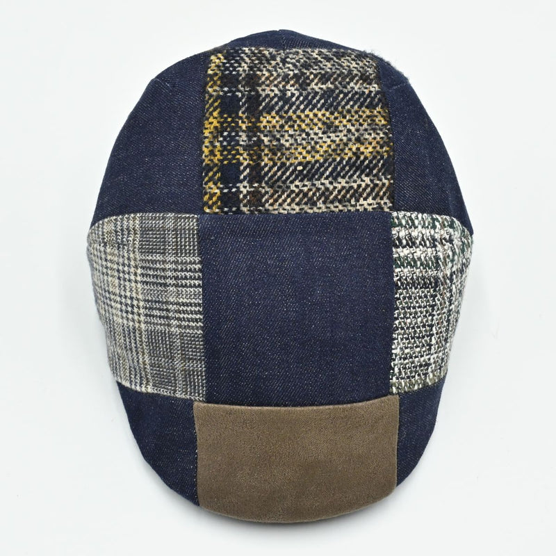 Top view of multicolor Jeans patchwork cap made from denim, wool, cotton, and mixed fabrics
