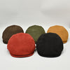 Front view of Green, Red, Black, Cognac, Brown Firenze leather Driver cap together on white background