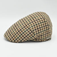 Side view of beige Pied de Poule wool cap in earth-tone pattern