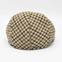 back view of beige Pied de Poule wool cap in earth-tone pattern