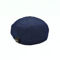 Navy Recco Denim Newsboy Hat. Italian cap on white background