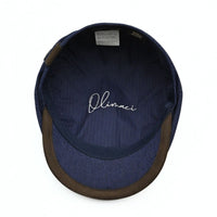 Navy Recco Denim Newsboy Hat. Italian cap on white background