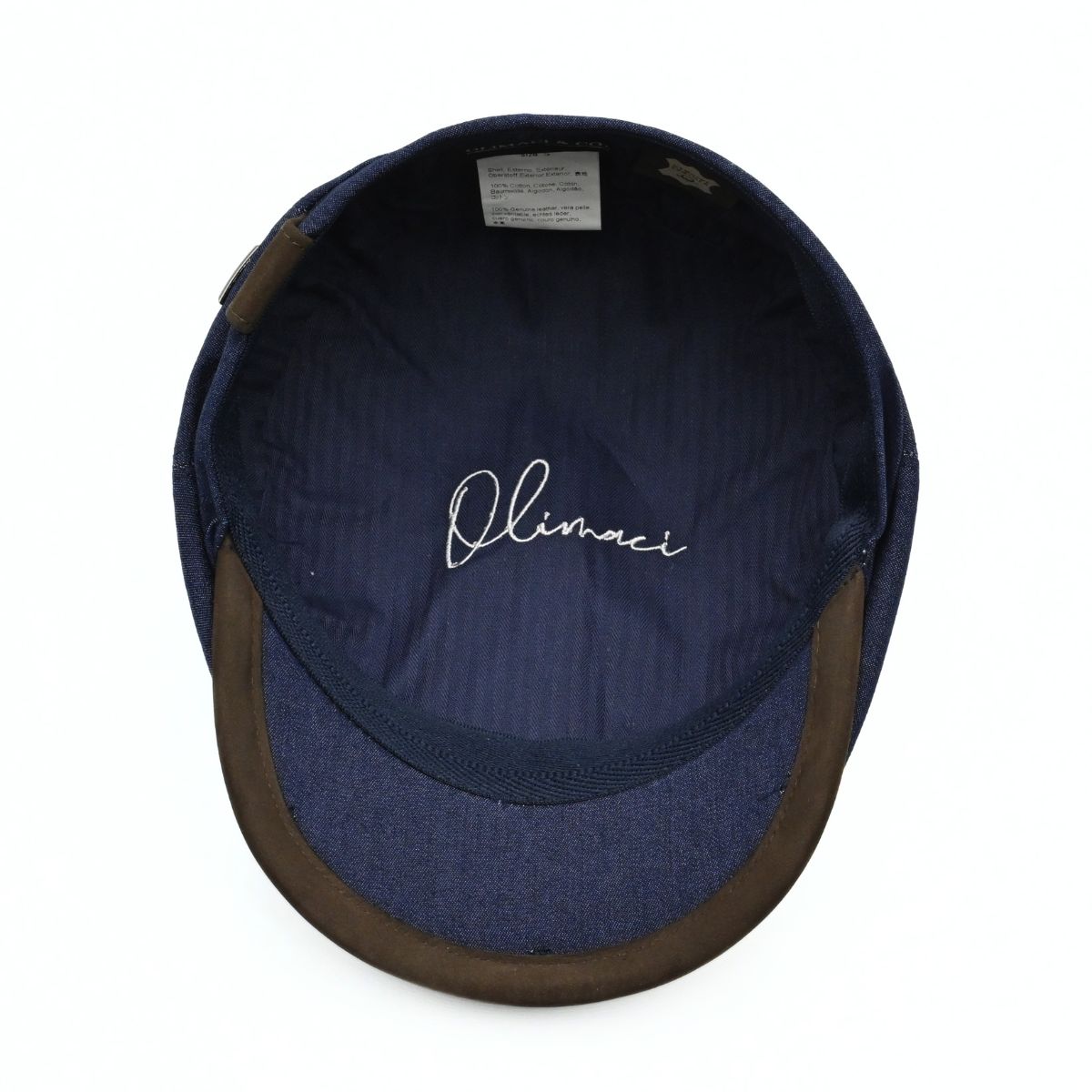 Navy Recco Denim Newsboy Hat. Italian cap on white background
