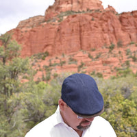 Guy in Navy Recco Denim Cap - Italian Summer cap with sodona red rocks in background