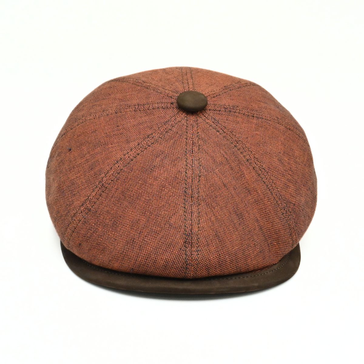 Rustico Linen Newsboy Hat with a button on a white background