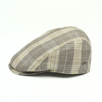 beige Trieste Plaid Driver Cap on white background