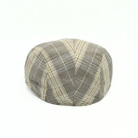 beige Trieste Plaid Driver Cap on white background