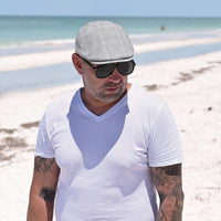 man in Gray Alfredo Linen Cap on Italian summer cap