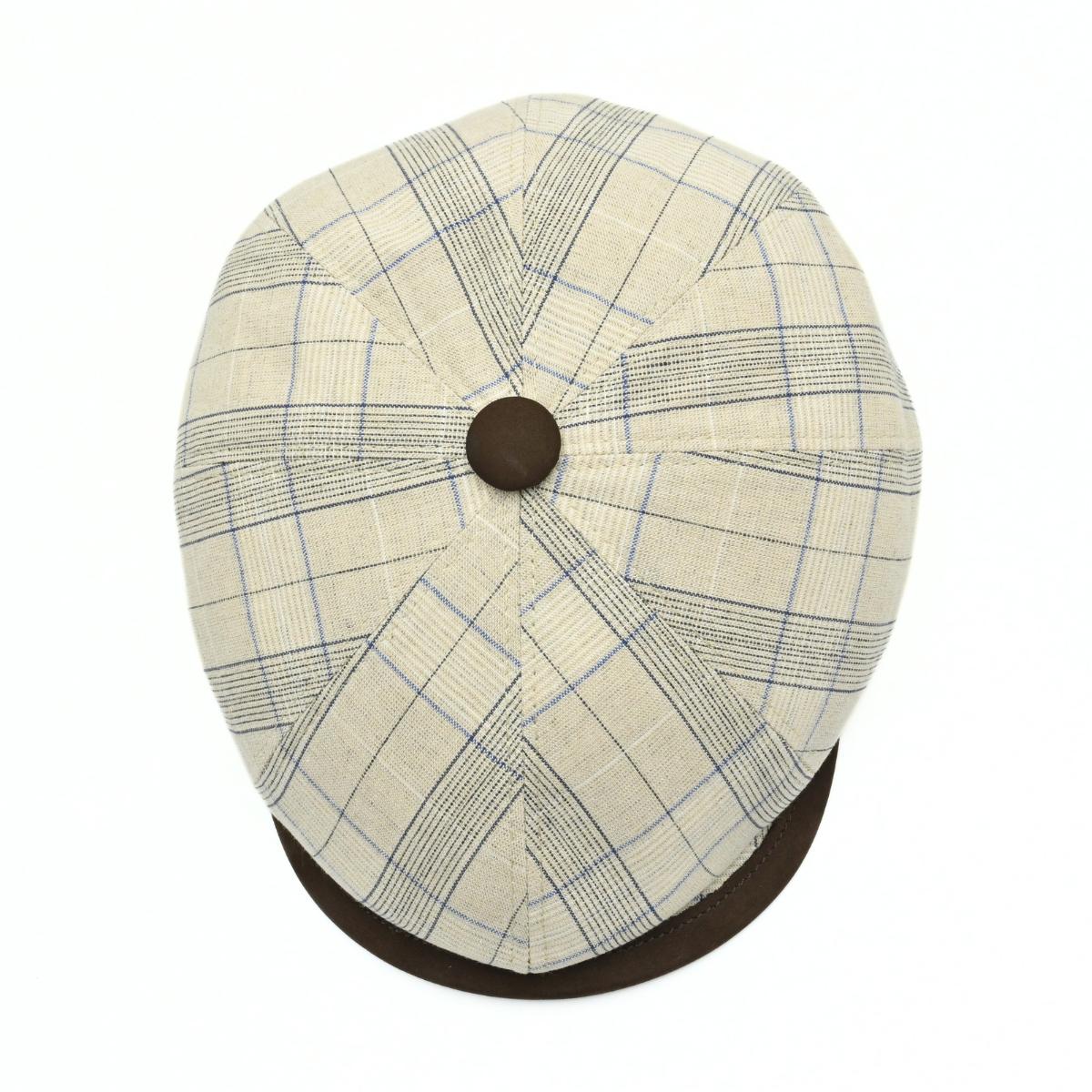 Beige Bartolomeo linen cotton newsboy hat with plaid pattern and leather visor on white background
