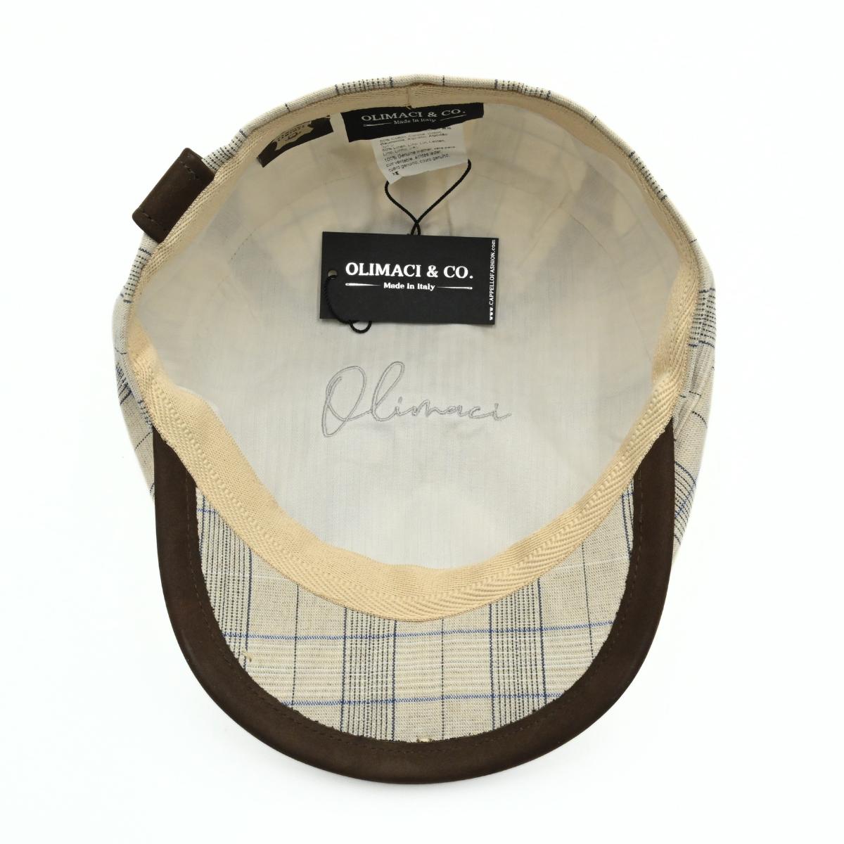 Beige Bartolomeo linen cotton newsboy hat with plaid pattern and leather visor on white background