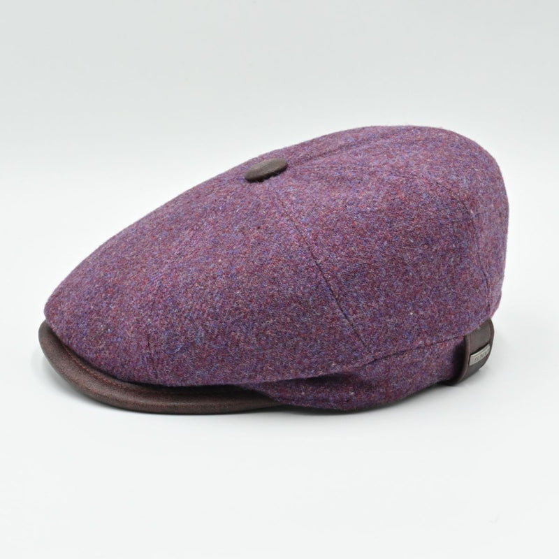 Side view: “Italian Shetland wool newsboy hat in lavender with genuine leather visor and button – side profile.”