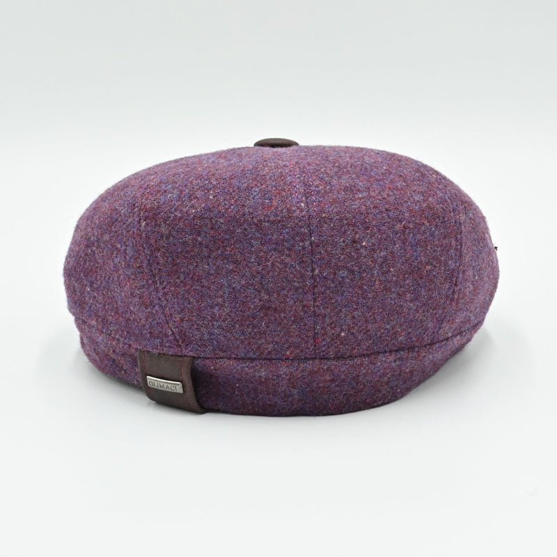 “Back view of lavender Shetland wool newsboy hat with Olimaci metal logo and leather tag – handmade in Italy.”