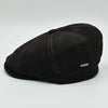 Black Modena Leather Newsboy Hat with red stitching side view