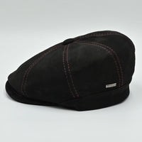 Black Modena Leather Newsboy Hat with red stitching side view