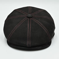 Black Modena Leather Newsboy Hat with red stitching top view
