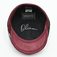 Inside view of the Chianti Bordo Patchwork Newsboy Hat showing the soft cotton lining for comfort