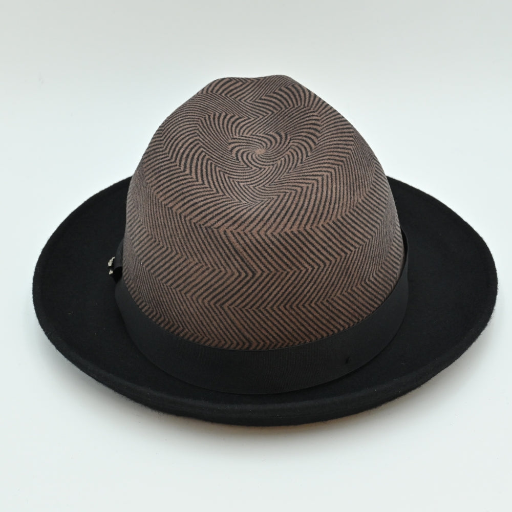 Back view of 1930's Style Two Tone Hat. Brown patterned crown with metal logo and black brim 