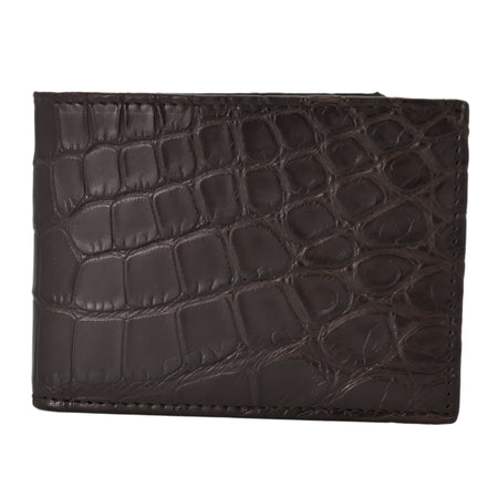 Side view of brown Alligator leather wallet on white background