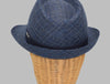 This image features a stylish Alpine fantasy hat on mannequin, made from a light, textured fabric with a blue band around the crown. It has a classic shape, with a slightly curved brim and a subtle logo on the side. The hat's neutral color and sophisticated design make it suitable for a variety of occasions.