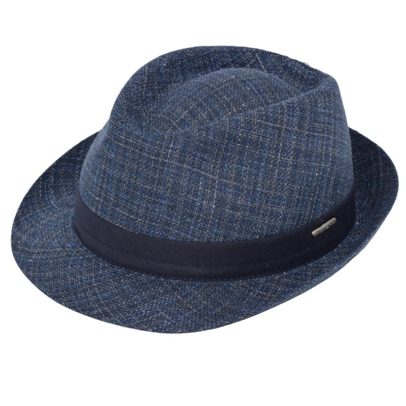 This image features a stylish Alpine fantasy hat made from a light, textured fabric with a blue band around the crown. It has a classic shape, with a slightly curved brim and a subtle logo on the side. The hat's neutral color and sophisticated design make it suitable for a variety of occasions.