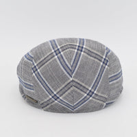 The back view of a gray flat cap with a blue and white plaid pattern, showcasing its symmetrical stitching and subtle metallic logo accent.