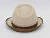 Rear view of a beige alpine hat with a structured crown, featuring a brown band and matching trim along the brim, showcasing its refined craftsmanship