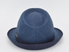 Rear view of a blue alpine hat with a structured crown, featuring a navy band and matching trim along the brim, showcasing its refined craftsmanship