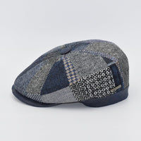 Blue newsboy hat side view