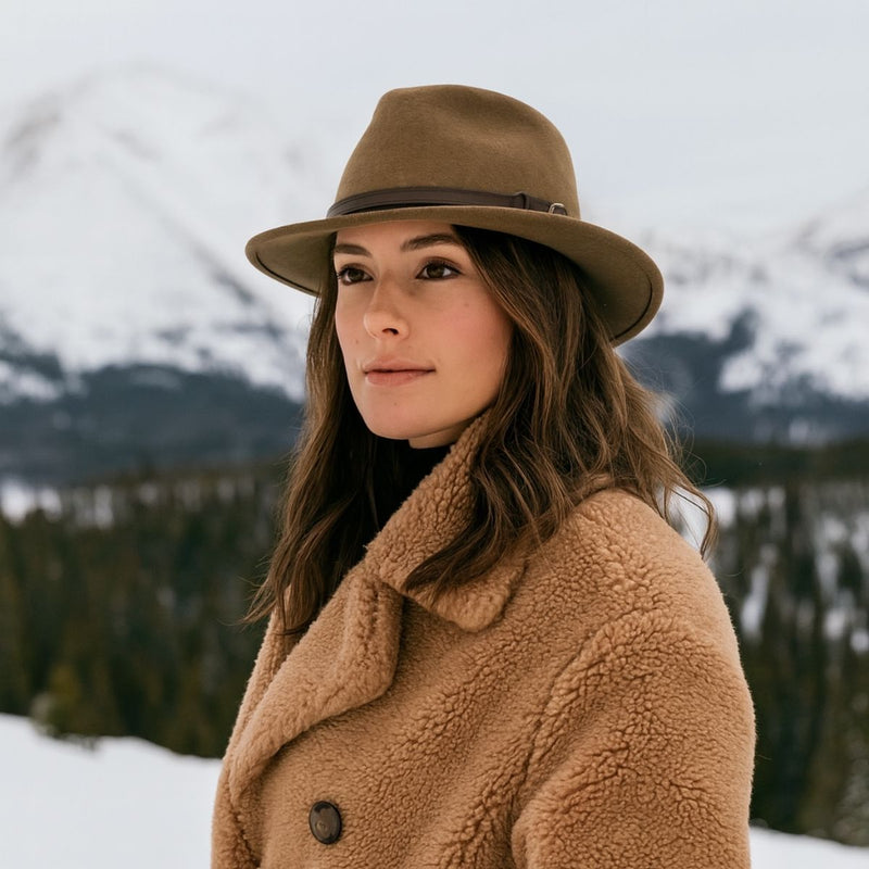 Woman in Caramel Indiana Jones Fedora Crushable Hat with mountains in background