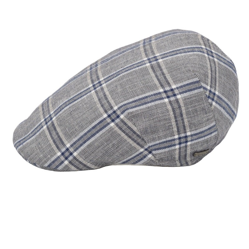 A grey flat cap with a classic blue plaid pattern, showcasing a side profile view and a subtle metallic logo accent on the side.