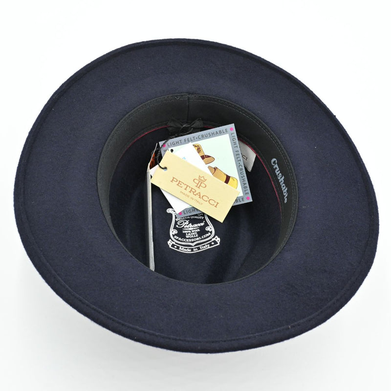 Interior view of navy Italian crushable wool fedora showing tags and sweatband