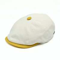 Ivory/Yellow Salerno Linen Newsboy Hat with yellow visor and button on white background