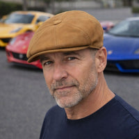 cognac Firenze Leather Newsboy Hat on model