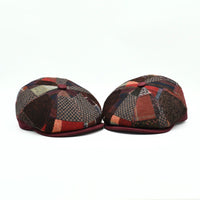 Front view of the two Bordo Chianti Patchwork Newsboy Hats with multicolor wool panels and faux leather visor