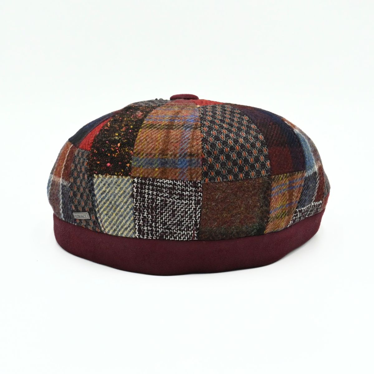 Back view of the Bordo Chianti Patchwork Newsboy Hat with unique multicolor fabric panels
