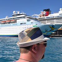 model in Multicolor Italian Patchwork Alpine Hat with cruise ships in  background