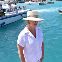 ivory Spanish Style Panama Hat on the model in the marina