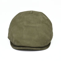 Green Leather Driver Cap on white background