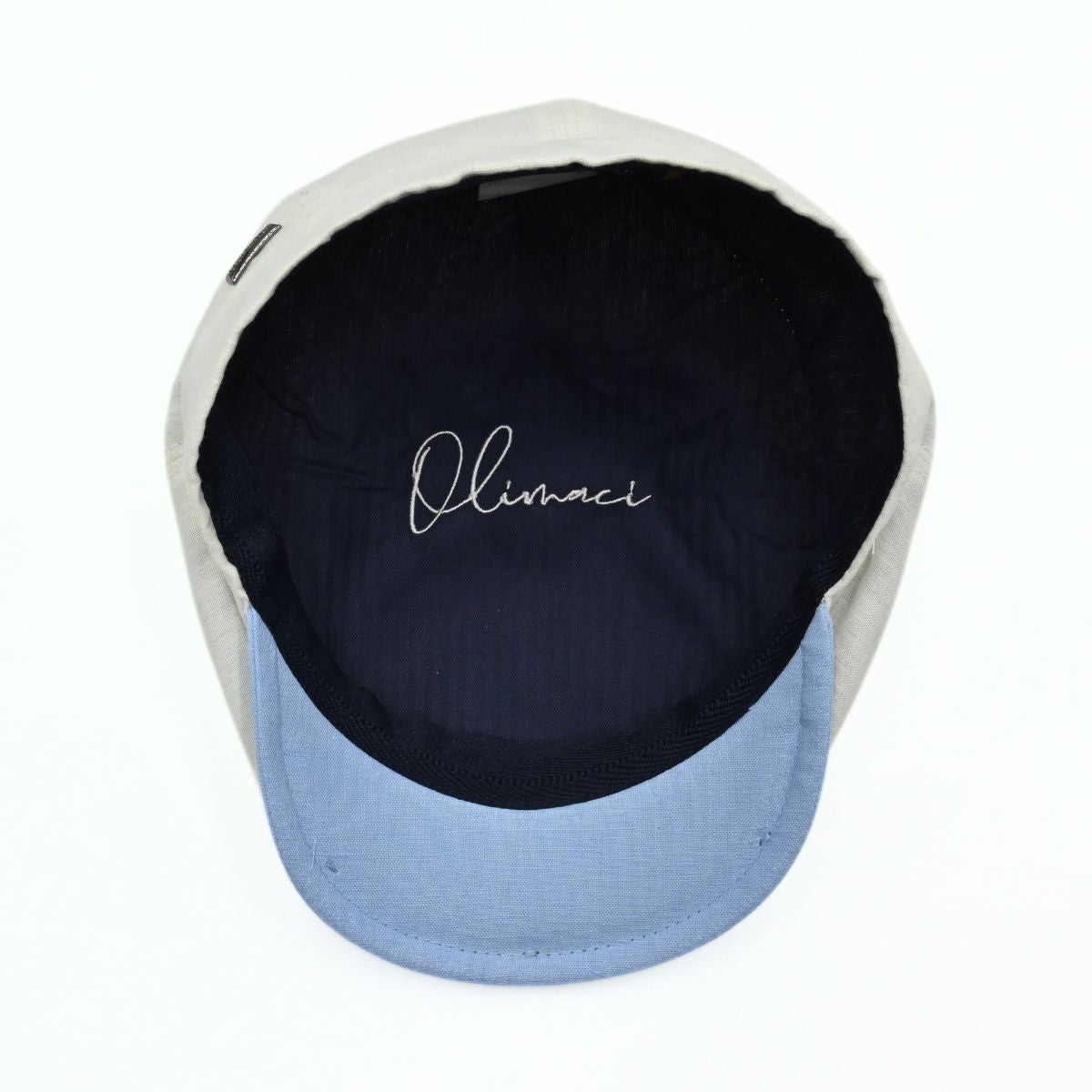 Ivory Salerno Linen Newsboy Hat with blue visor on white background