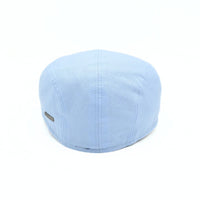 Blue Positano Linen Flat Cap on white background.  Italian summer flat cap. Olimaci.