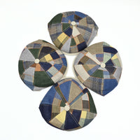 Four Multicolor Italian Patchwork Newsboy Hats on white background