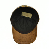 Bolzano Heritage Wool Baseball Cap featuring a brown and navy blue plaid pattern on the crown, with a textured brown visor and a small metal brand tag on the side, set against a plain white background.